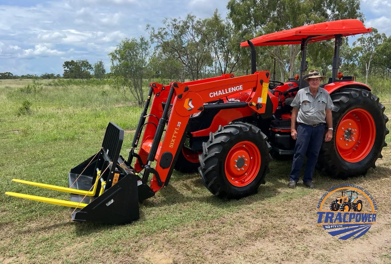 Hamme and Co with a Kubota M9540DH tractor, GP bucket and pallet forks