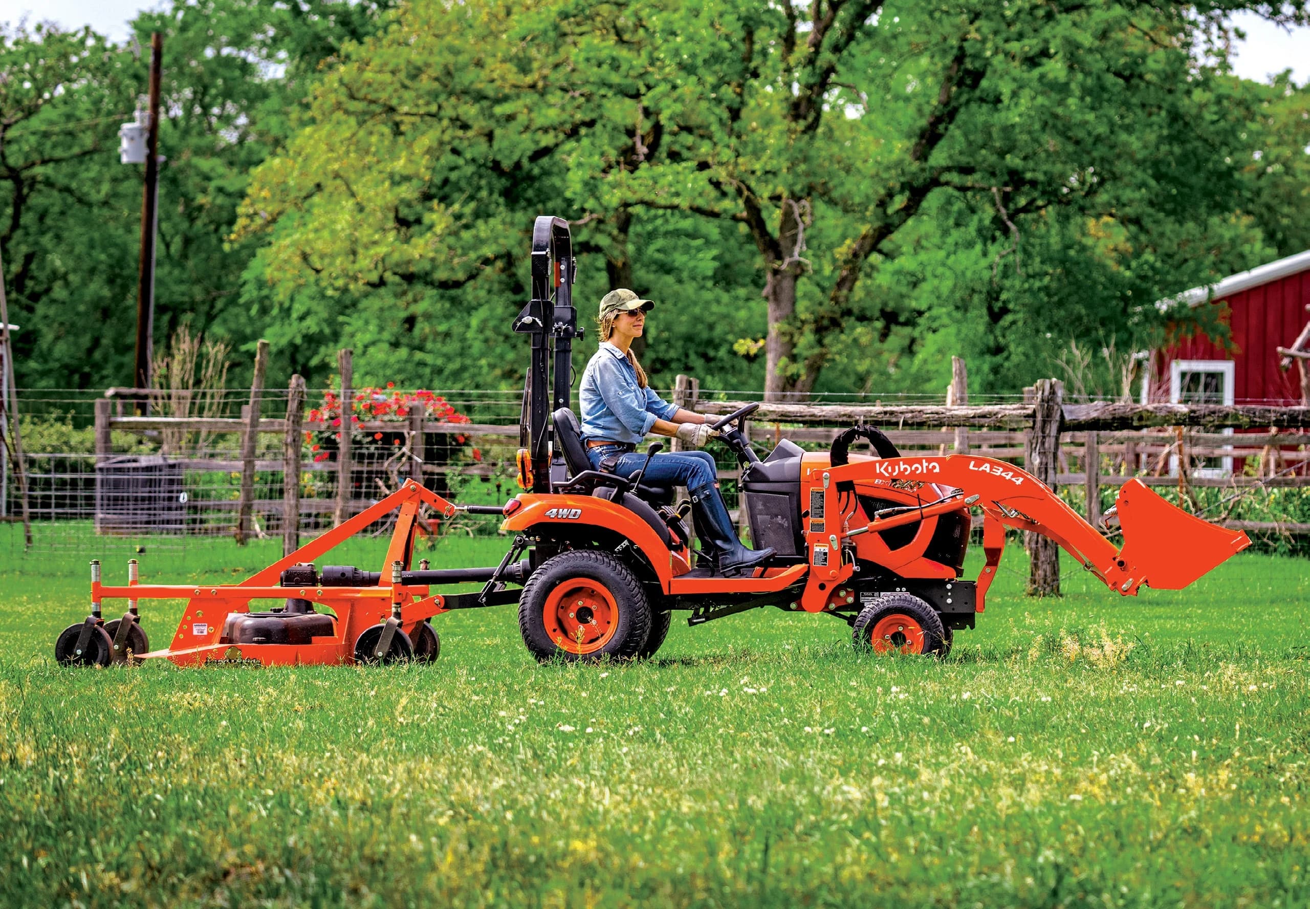 Kubota BX80 Series tractors and matched implements on an acreage property